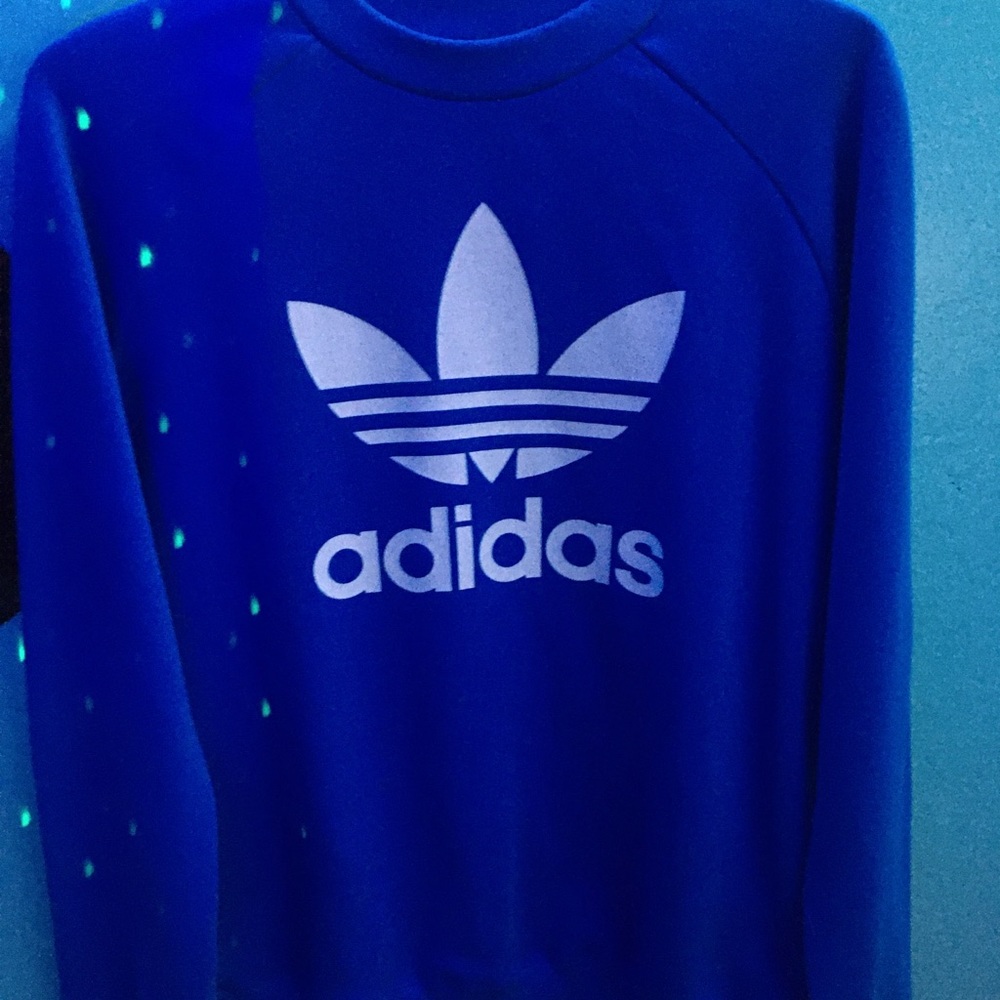 Brand new never used adidas sweatshirt in a size medium with tag attached